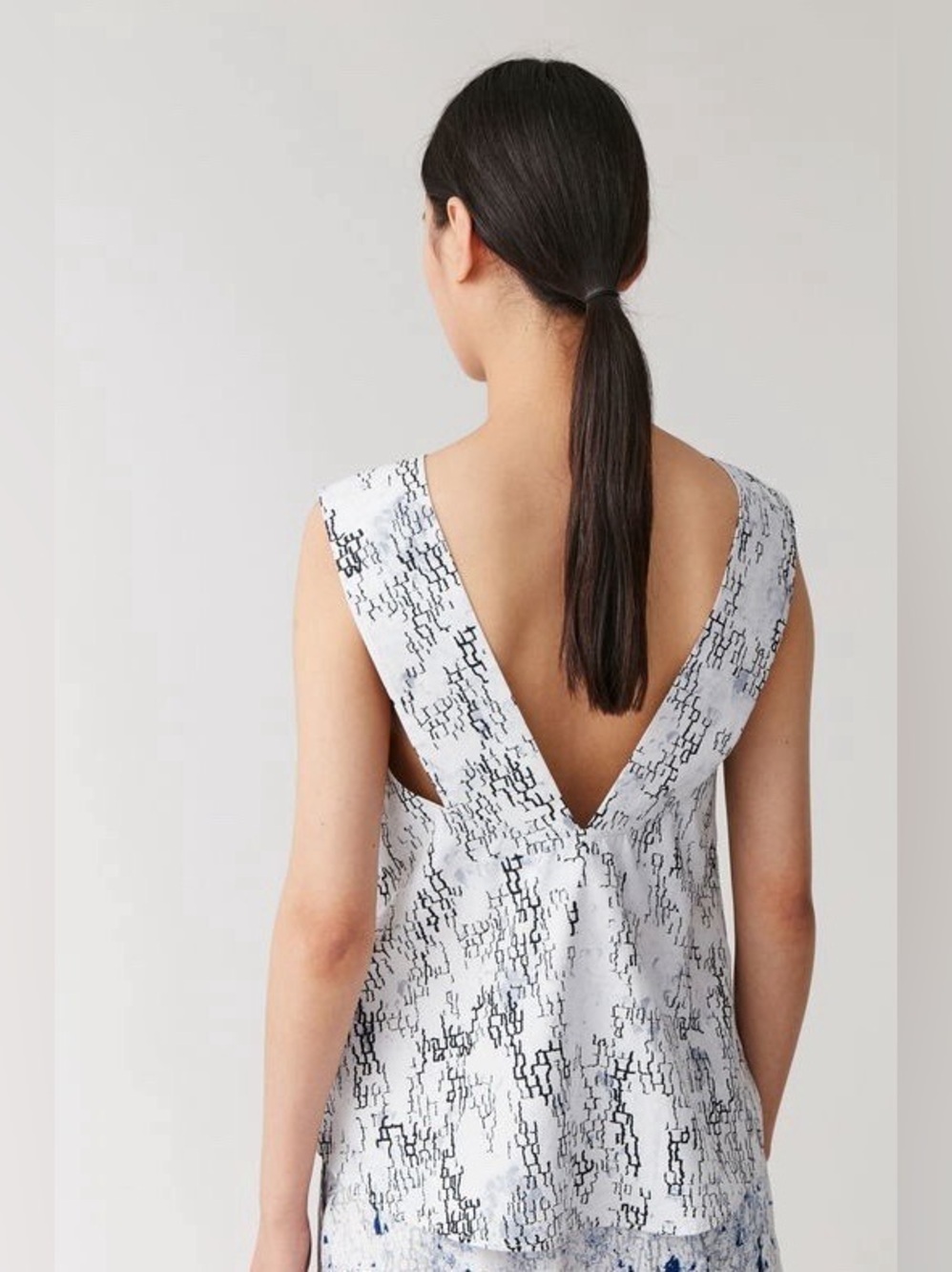COS sleeveless top with a blue and black abstract geometric pattern - Picture 2 of 14